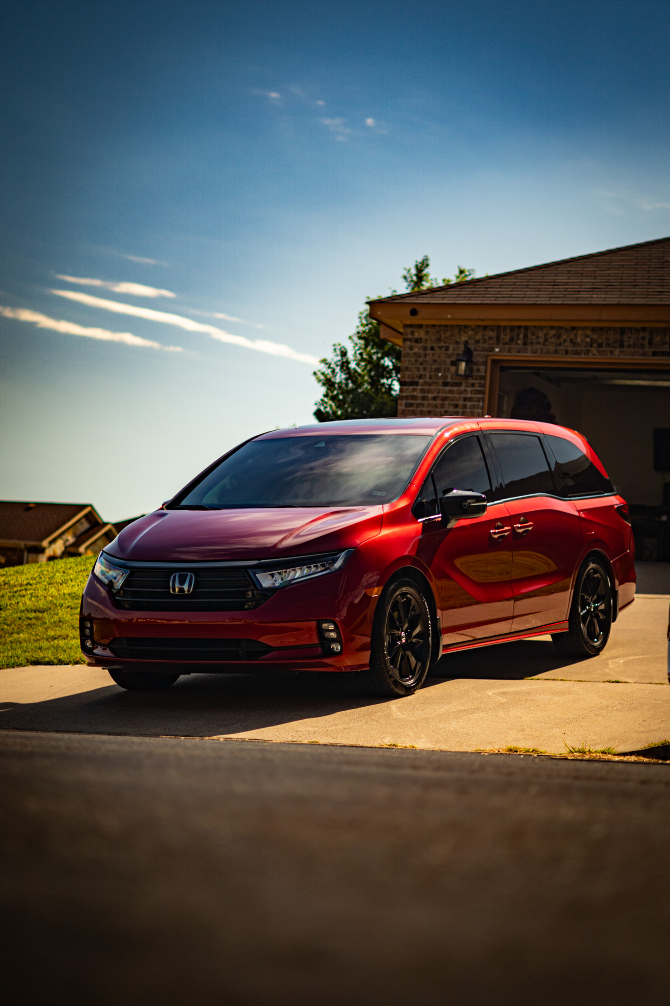 Ceramic window tint on red Honda Odyssey minivan — Chroma Auto Lab Killeen TX