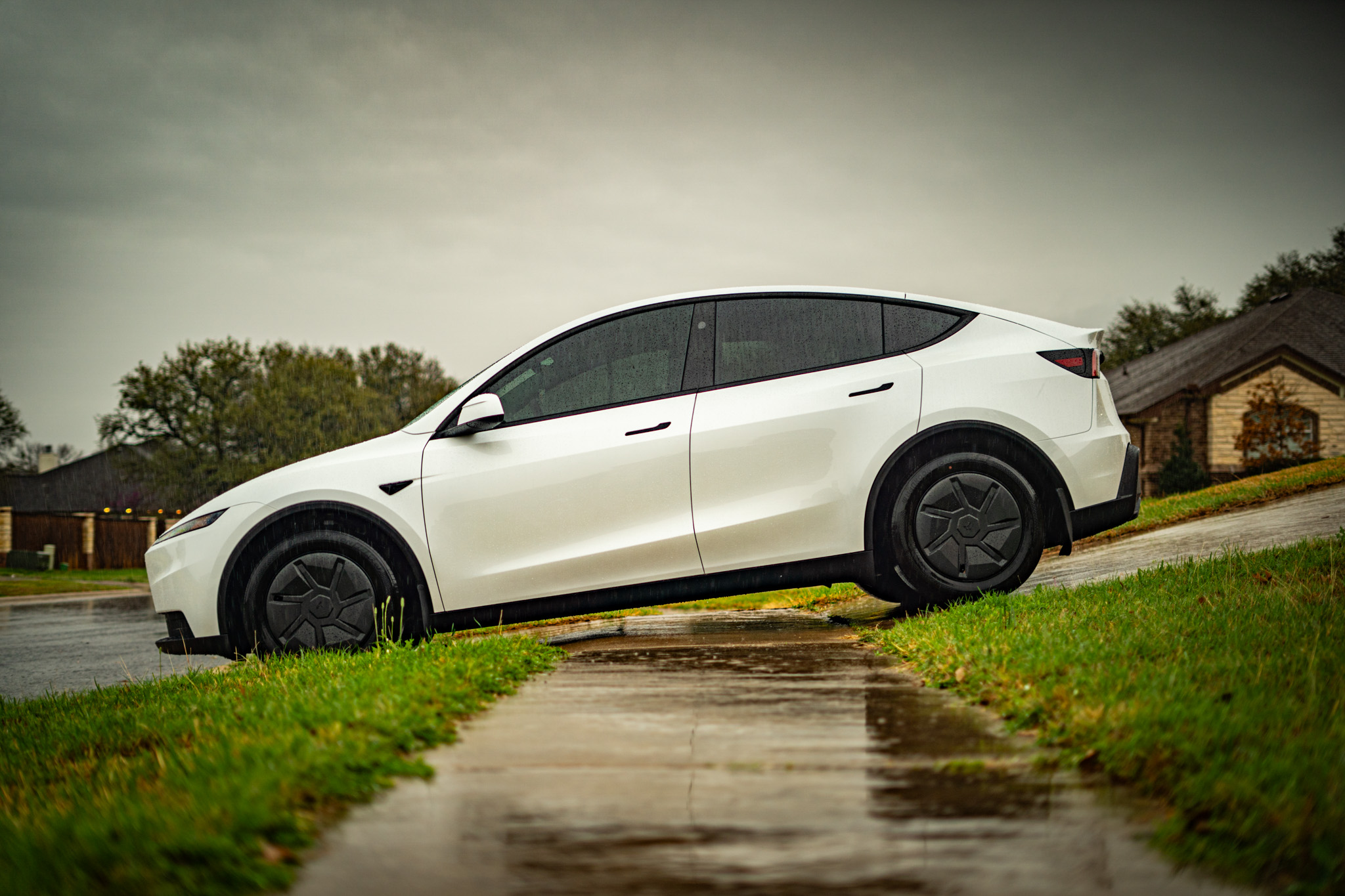 Ceramic window tint on white Tesla Model Y — side profile, Chroma Auto Lab