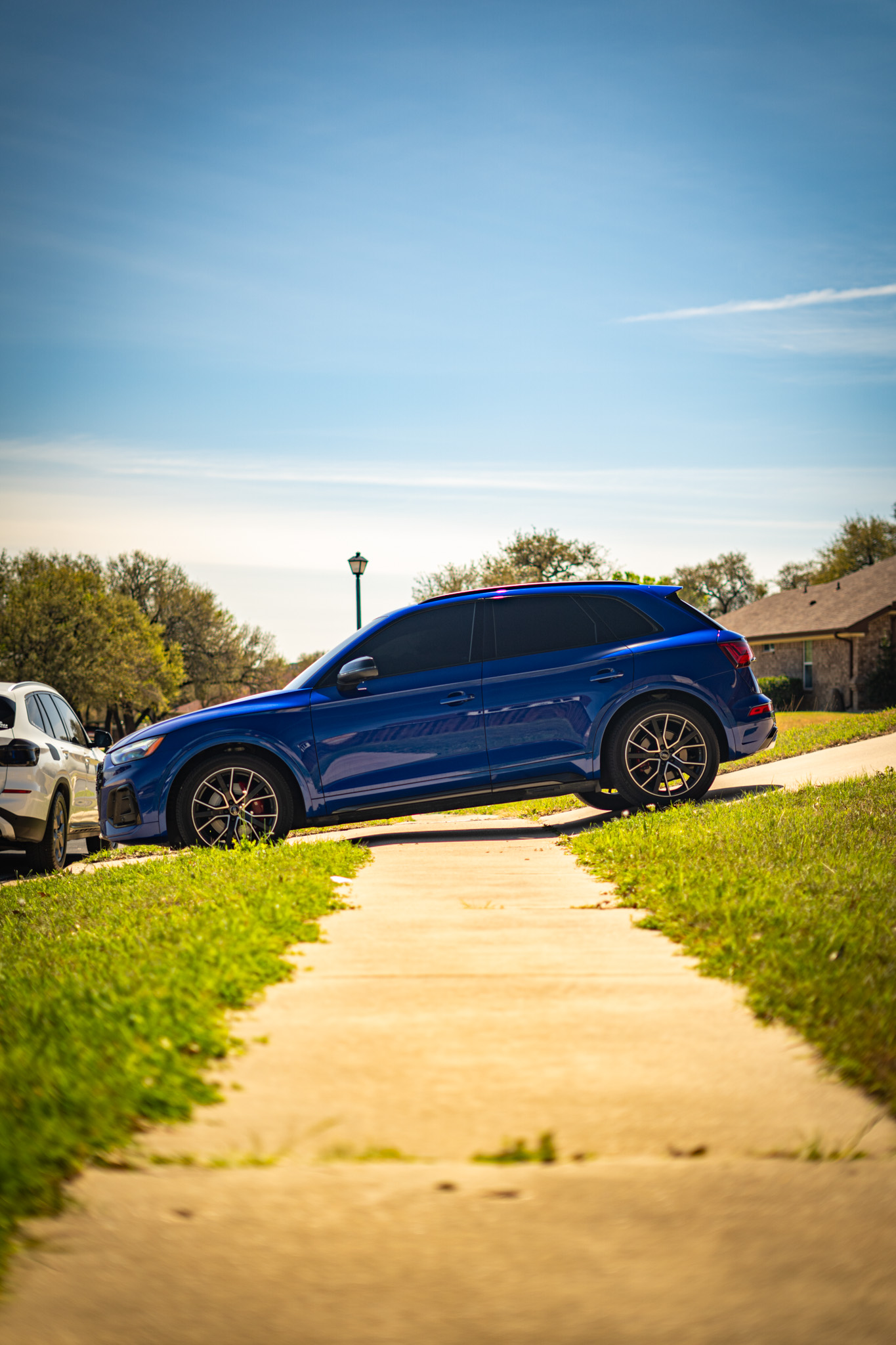 Ceramic tint on blue Audi SQ5 — side profile, Chroma Auto Lab Killeen TX