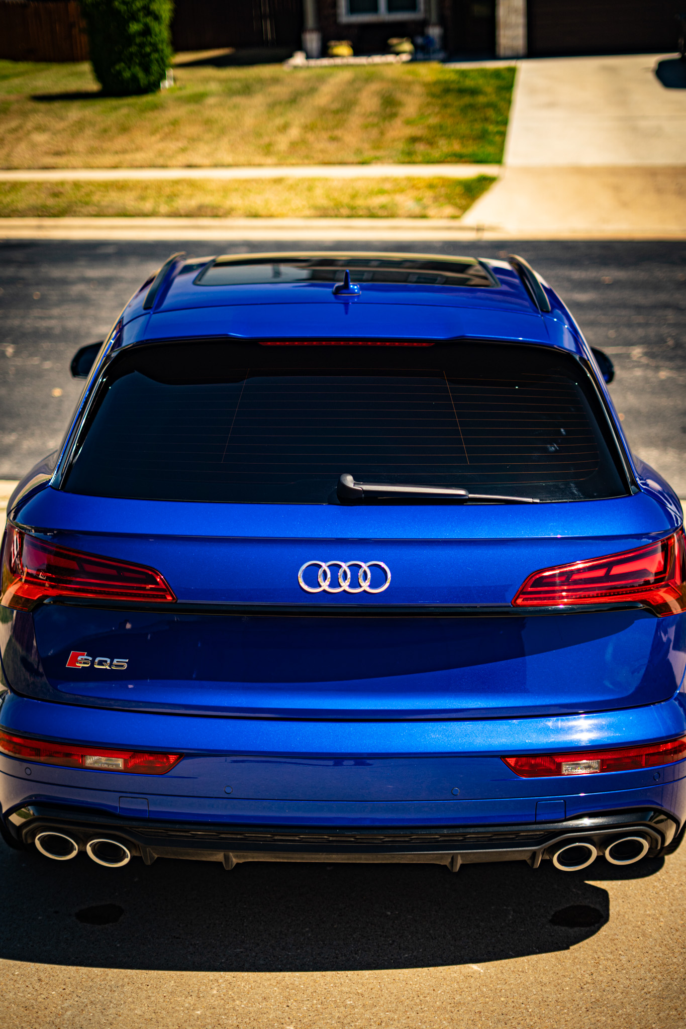 Window tint on blue Audi SQ5 — rear view showing tinted back glass, Killeen TX
