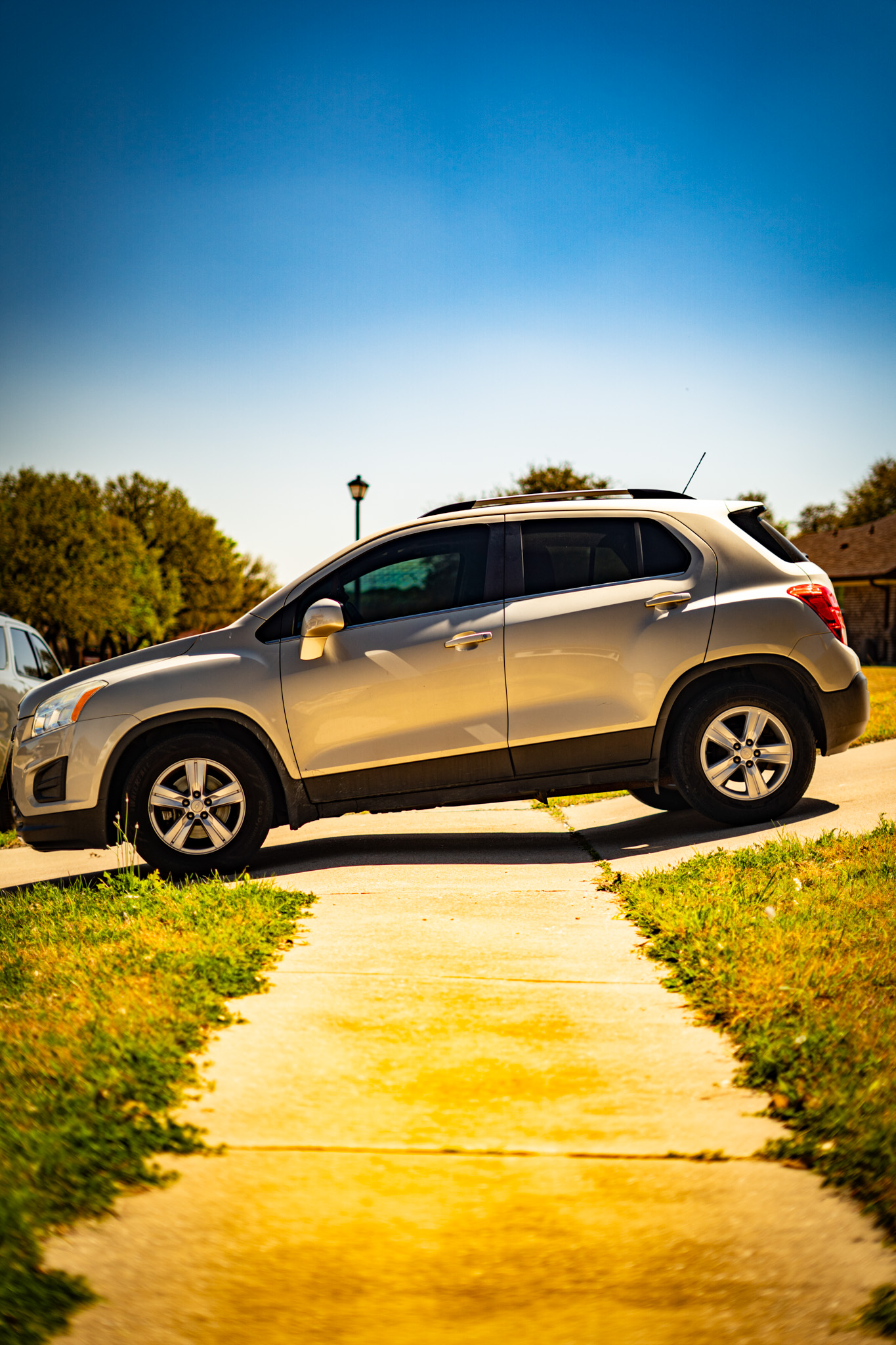 Window tint on silver Chevrolet Trax SUV — side profile, Killeen TX