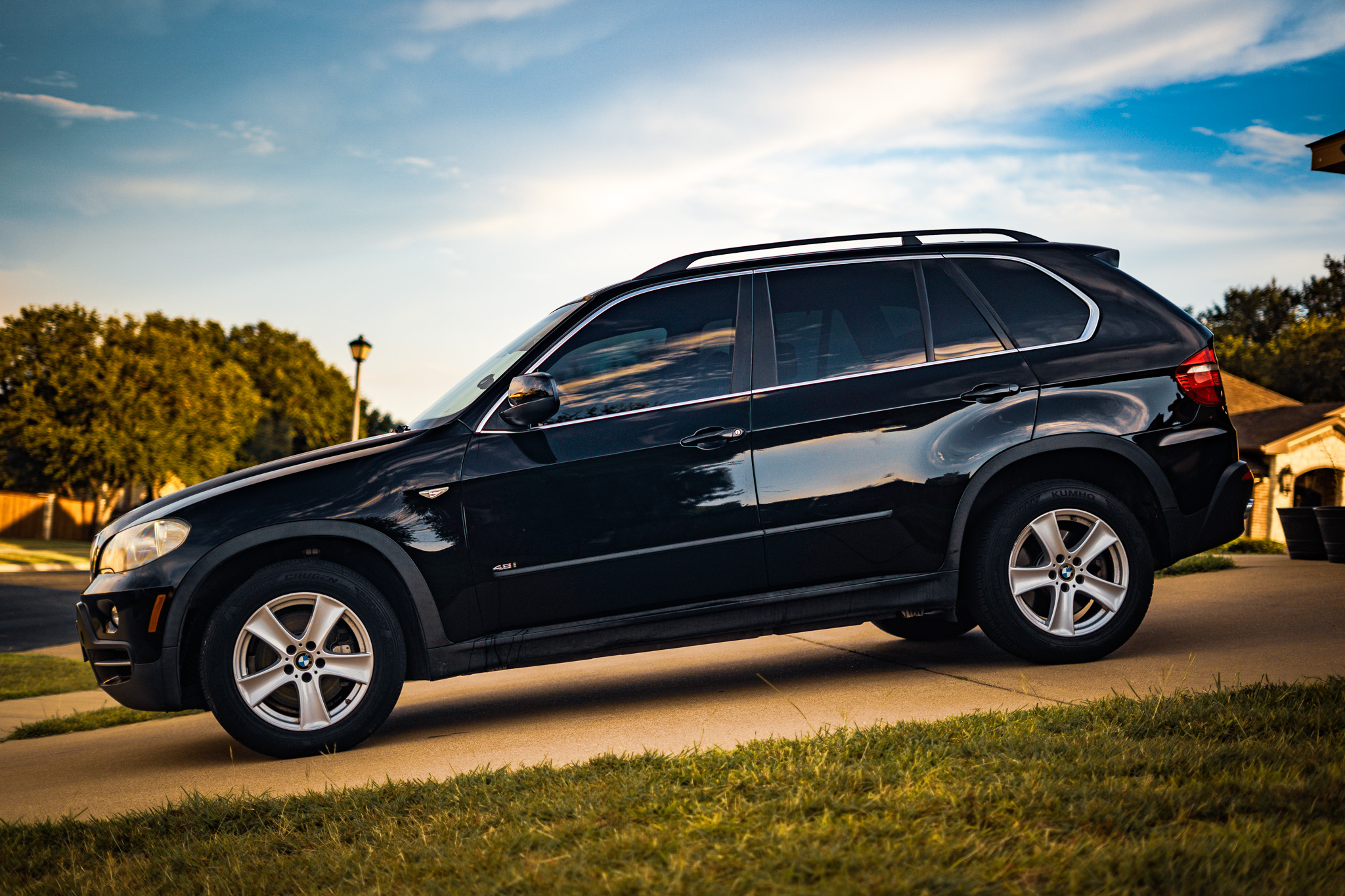 Dark window tint on black BMW X5 SUV — clean side profile, Killeen TX